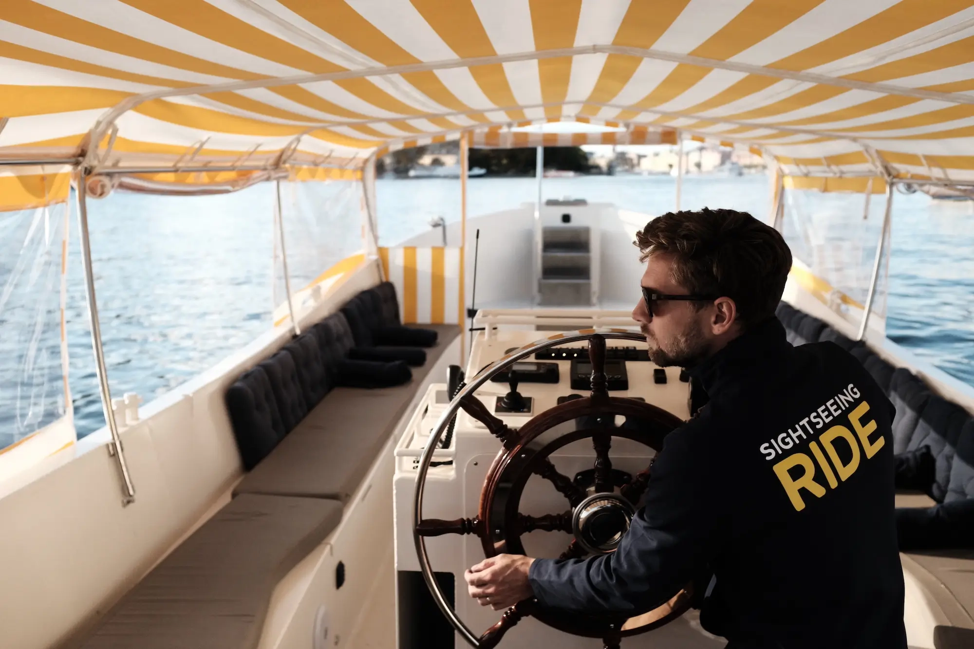 Stockholm Sightseeing Ride boat inside with captain